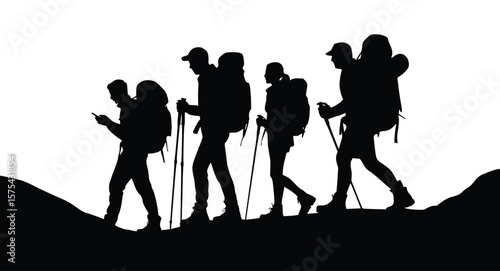 Backpackers hike along a mountain trail, silhouetted against the sky, exploring nature and enjoying the outdoors as they trek with hiking poles.