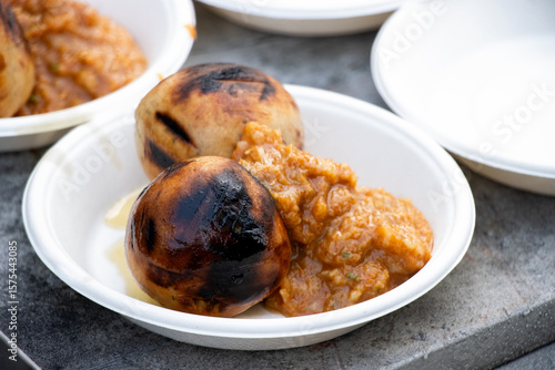 Traditional Bihari dish Litti Chokha served on a plate, showcasing authentic Indian cuisine and regional street food culture.

