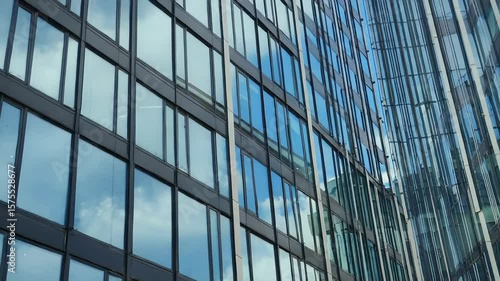 Wallpaper Mural Modern glass skyscrapers reflecting blue sky and clouds Torontodigital.ca