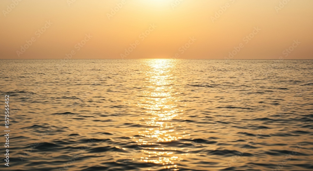 Obraz premium Sunset over calm ocean