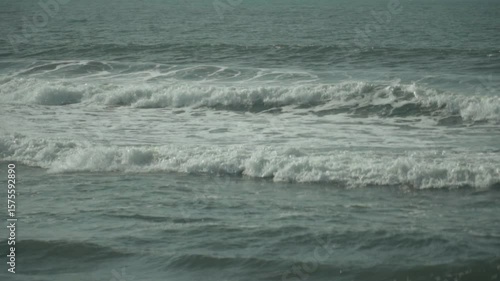120 fps slow motion shot of ocean waves in closeup.