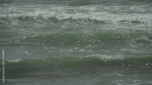 120 fps slow motion shot of ocean waves in closeup.