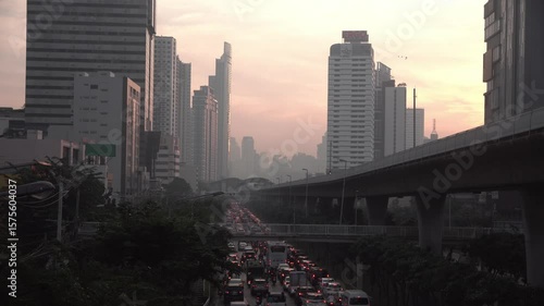 Cityscape of Bangkok covered by mixture of dust in air pollution. Heavy air pollution of fine particulate matter (PM2.5) in morning.	