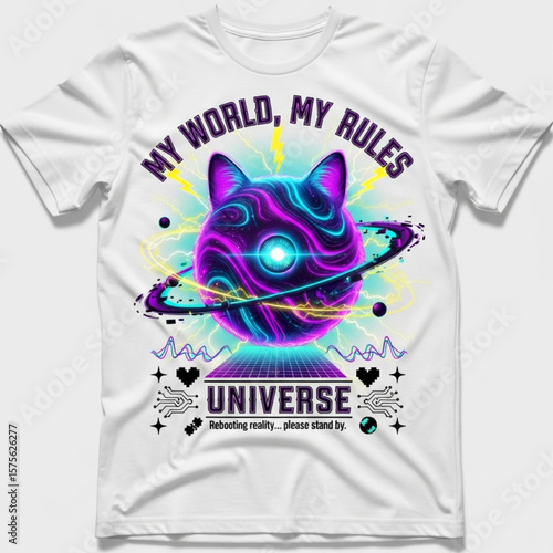 A full-frame shot of a white t-shirt displaying a unique and colorful graphic of a cat-eared planet, techno-futuristic elements, and bold, inspirational typography.