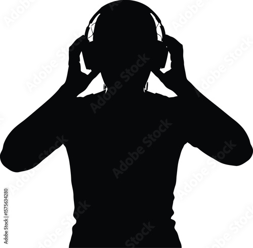 Silhouette of person adjusting headphones against a bright white background