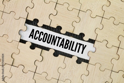Foto Wooden puzzle with the word ACCOUNTABILITY