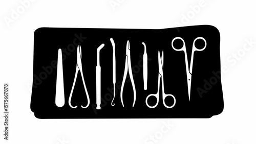 A collection of surgical instruments including forceps and scissors on a black background displayed neatly