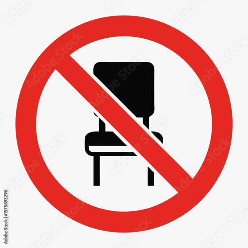 Chair prohibited sign with red circle and diagonal line over black chair icon. Chair not allowed concept illustrates symbol and restriction. Visual chair prohibited sign for rules and regulations.