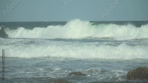 120 fps slow motion shot of ocean waves in closeup.