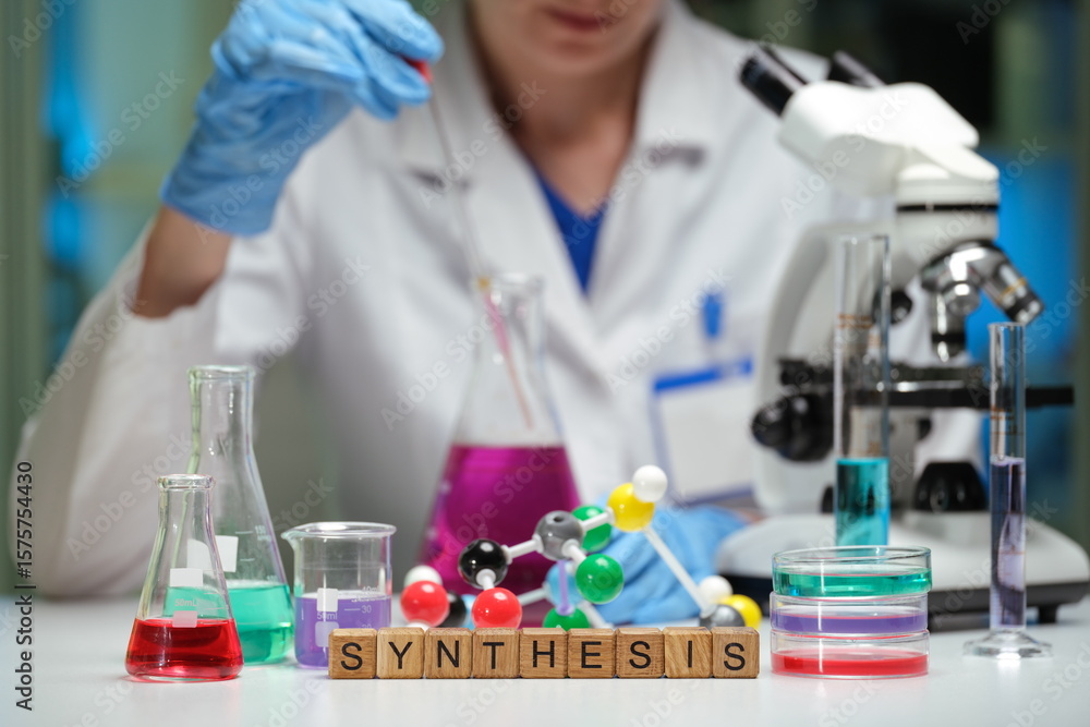 A skilled chemist expertly conducts complex experiments focusing on synthesis within a controlled lab environment A skilled chemist expertly conducts complex experiments focusing on synthesis within a controlled lab environment
