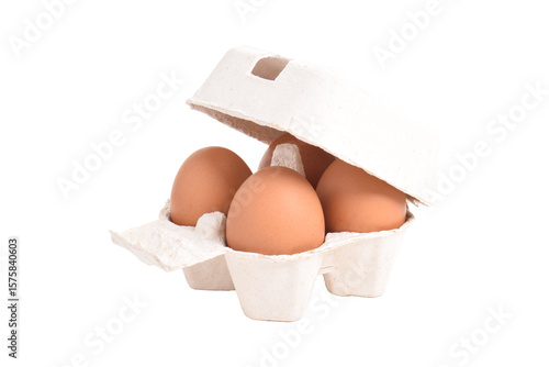 Open egg box with brown eggs isolated on white background with clipping path. Fresh organic chicken eggs in carton pack or egg container