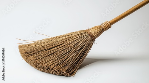 Wallpaper Mural Light brown broom on white background Torontodigital.ca