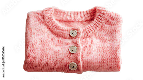 Folded pink sweater with buttons, perfect for cozy outfits and stylish layering.