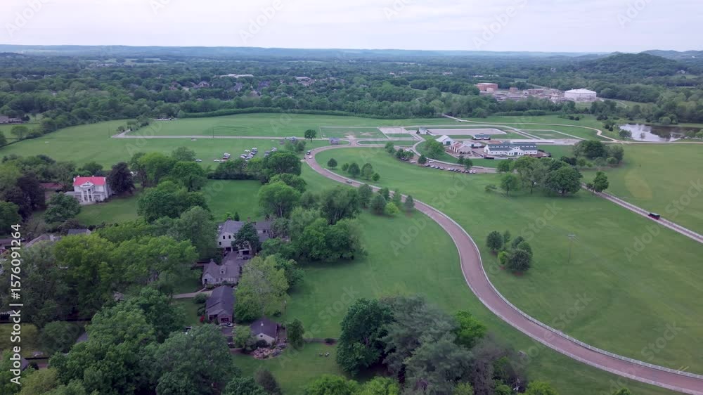 Luxury Estate Surrounded By Fields And Neighboring Homes In Franklin, Tennessee. Aerial Flyover. Luxury Estate Surrounded By Fields And Neighboring Homes In Franklin, Tennessee. Aerial Flyover.