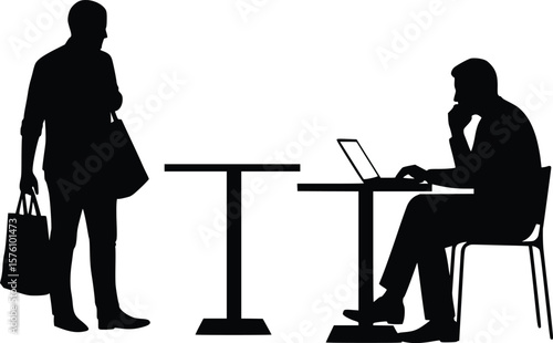 Silhouette showing professional with briefcase and seated individual working on laptop in office environment