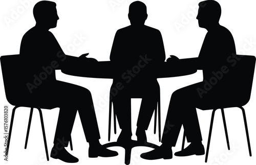 Silhouette showing three suited individuals around a table in a formal meeting or collaborative discussion