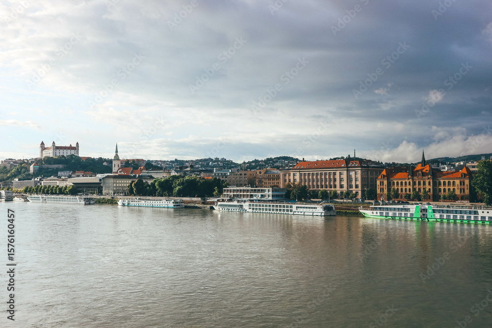 Obraz premium panorama of bratislava after storm clouds during day with castle on top 