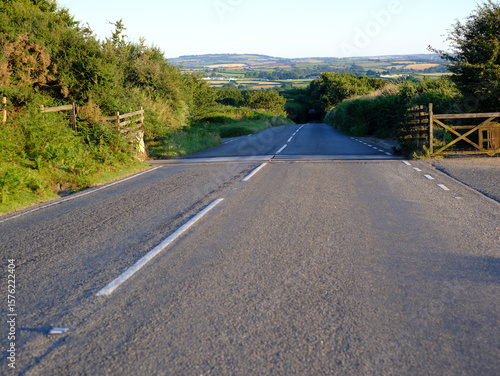 The open road in a Cornish landscape. Different views of small country roads close to Bodmin Moor on a warm summer evening. No cars or people.