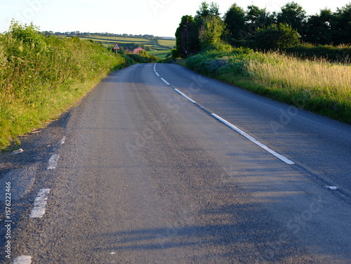 The open road in a Cornish landscape. Different views of small country roads close to Bodmin Moor on a warm summer evening. No cars or people.
