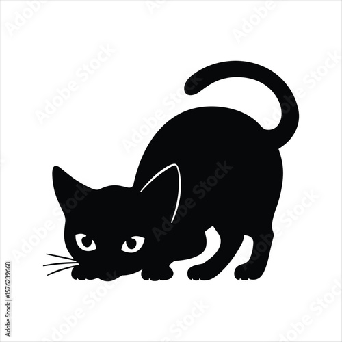 Black cat silhouette crouching with wide eyes and curled tail crouching cat pose