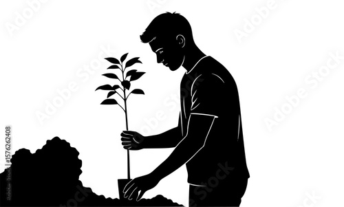 A man planting a small tree sapling into the soil, symbolizing growth and care for nature