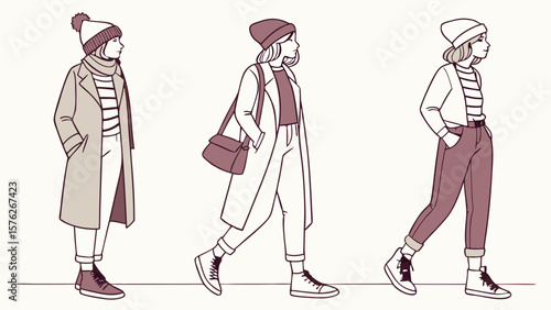 Three stylish women in winter coats and beanies walking side by side