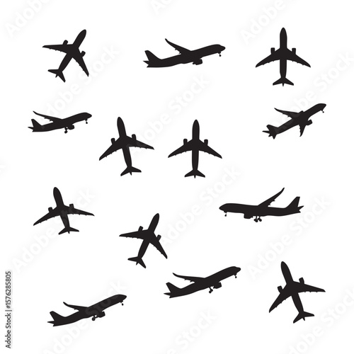Collection of airplane silhouettes in various flight positions isolated on white background silhouette