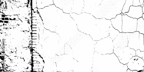 white textured wall with cracks and brick foundation, creating a distressed and some dark spots, textured appearance. it looks aged	