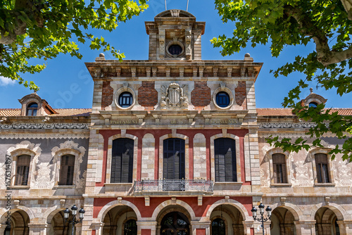 Barcelona, Spain-April 21, 2025. Facade of the Parliament of Catalonia in Ciutadella Park, Barcelona, Spain showcasing neoclassical architecture on a bright summer day.