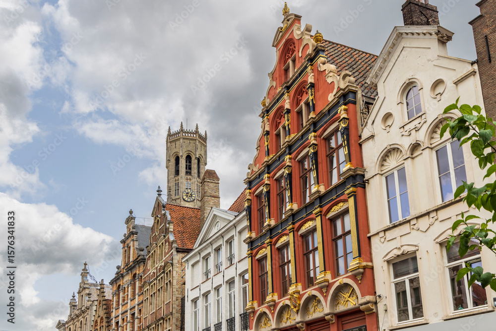 Fototapeta premium Colorful gable houses and Bellfort tower (Halletoren) at Great market square of Brugge in Belgium
