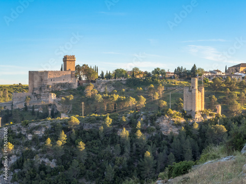 Overview of the village of Alarcón with the Jucar River and the walled enclosure of the castle, declared a historic-artistic site.