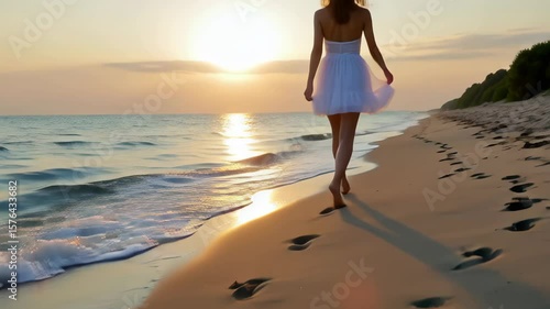 A person is walking on the beach