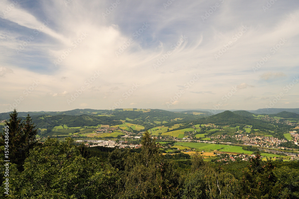 Obraz premium Summer in Czech Central Mountains with Green Fields Landscape and Blue Skies
