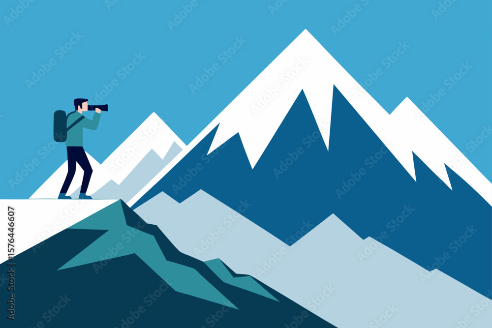 photographer standing on cliff overlooking snowy photographer standing on cliff overlooking snowy