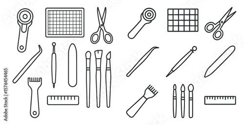 Collection of art supplies including scissors, rulers, and other tools. Concept of creativity and craftsmanship