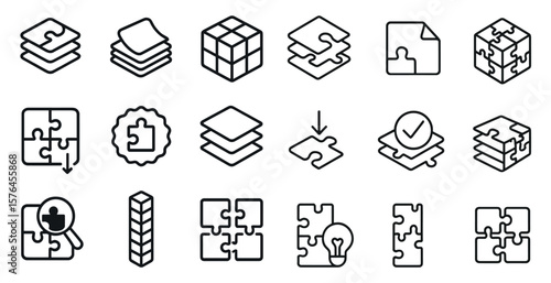Set of puzzle pieces with a variety of shapes and sizes. The pieces are arranged in different ways, with some overlapping and others standing alone. Scene is one of creativity and problem-solving