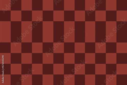 Checkerboard design in terracotta and dark brown hues offers a versatile geometric texture and seamless pattern.