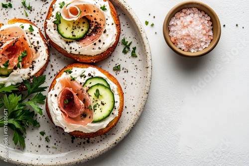 Delicious Open-Faced Sandwiches Topped With Smoked Salmon, Cucumbers, and Fre...