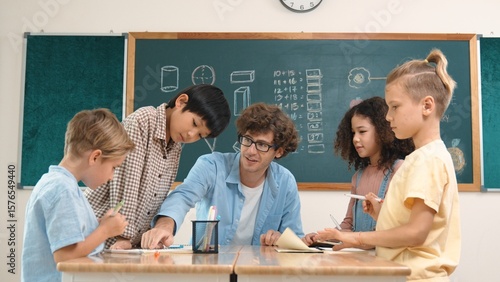 Photography Smart teacher explain idea while diverse children drawing mind map while group of diverse student working together to do class work