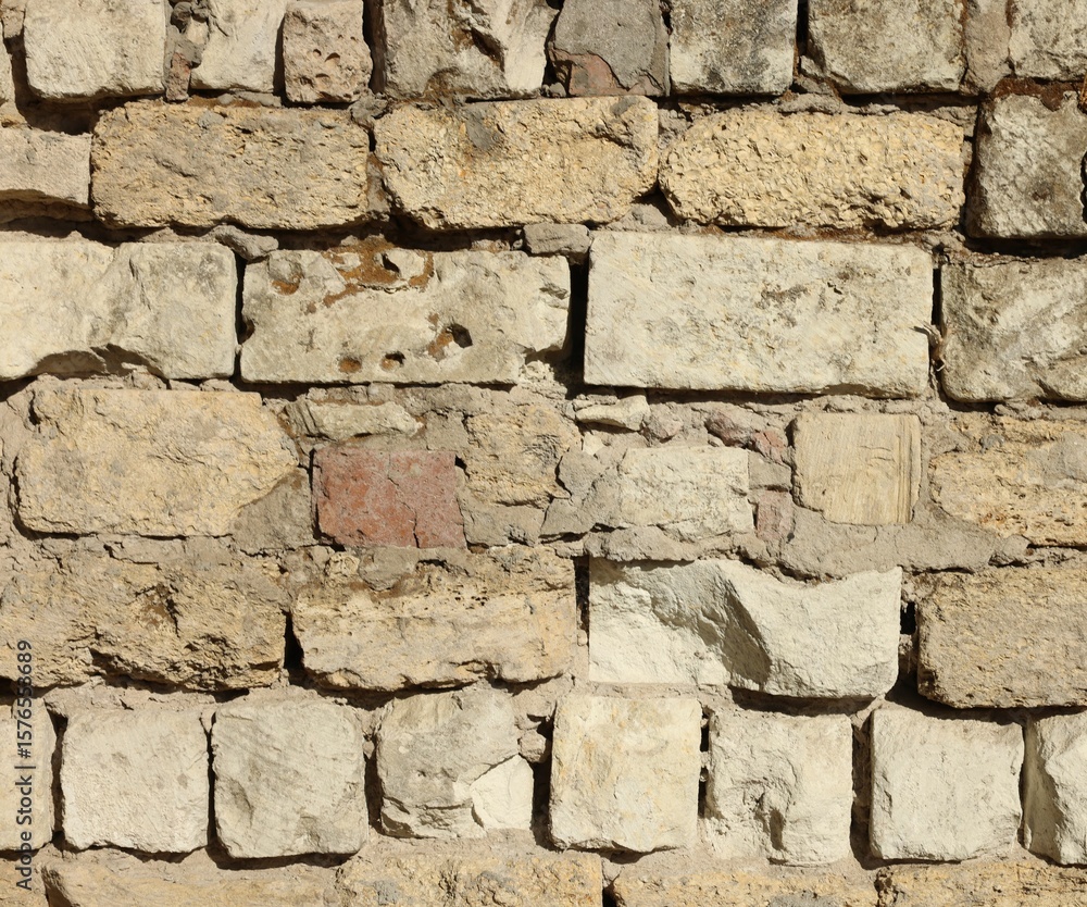 Fototapeta premium Texture of old brick wall as background, closeup