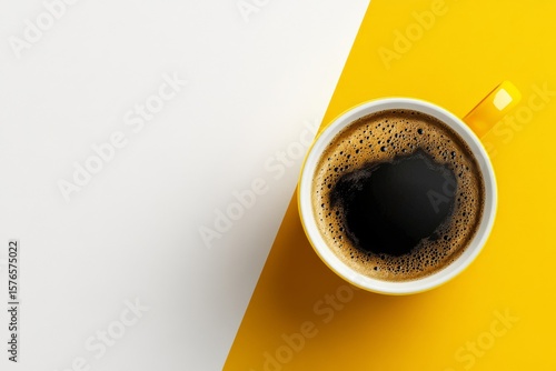 Coffee Cup on Vibrant Yellow Background With Contrasting White Surface for Ey...