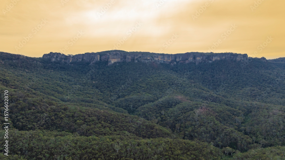 Obraz premium Drone aerial photograph of the widest canyon in the world the Capertee Valley in Wollemi National Park in the Central Tablelands of NSW, Australia.