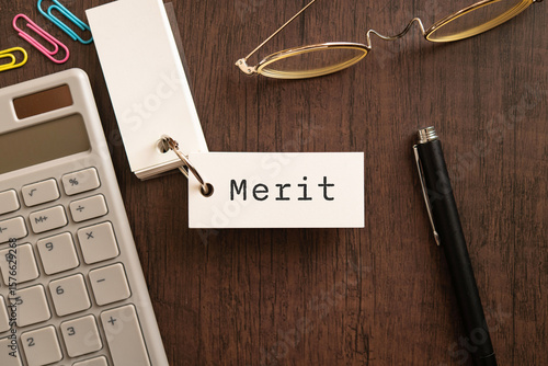 There is word card with the word Merit. It is as an eye-catching image.