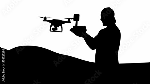 Silhouette of man holding drone controller with drone in air against white background on a hillscape