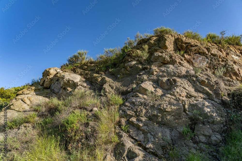 MIDDLE TOPANGA FORMATION AND VOLCANIC ROCKS / Dark gray sandstone of basaltic grains. top of Mount Hollywood Trail, Griffith Park, Los Angeles, California. Santa Monica Mountains. MIDDLE TOPANGA FORMATION AND VOLCANIC ROCKS / Dark gray sandstone of basaltic grains. top of Mount Hollywood Trail, Griffith Park, Los Angeles, California. Santa Monica Mountains.