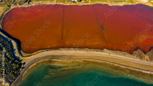 Red salt sea lake, at winter, village Alyki, Boeotia, Greece.