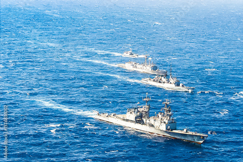 Naval Warships in Tactical Formation on Open Ocean Patrol