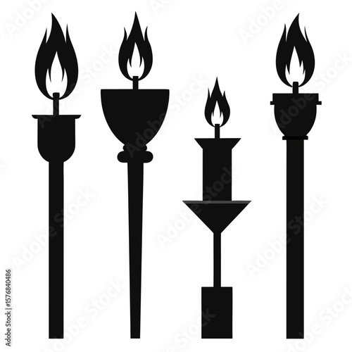 Black silhouettes of four torches and candles with flames fire light