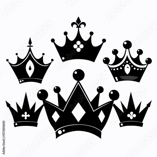 Royal crowns with ornate gem cutouts and pointed spikes regal monarchy