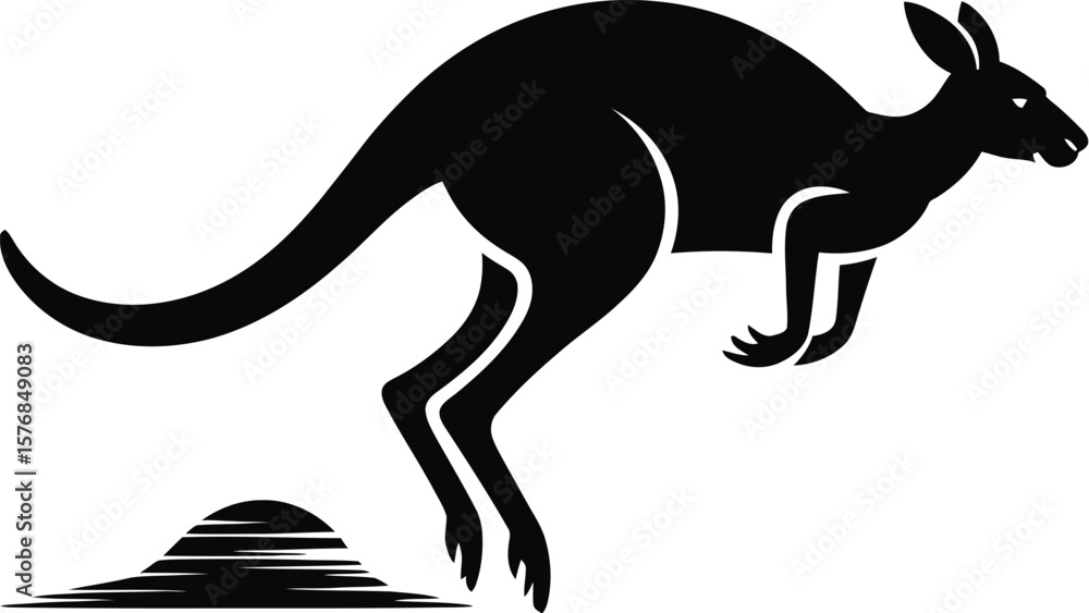 Fototapeta premium Black kangaroo leaping over mound jumping marsupial